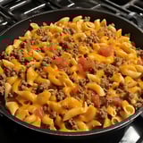 A bowl of macaroni and cheese.